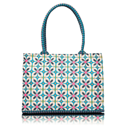 Spacious printed shoulder bag for women, colorful geometric pattern tote for daily use.