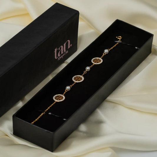 zircon studded golden bracelet in black gift box by tanstore.pk