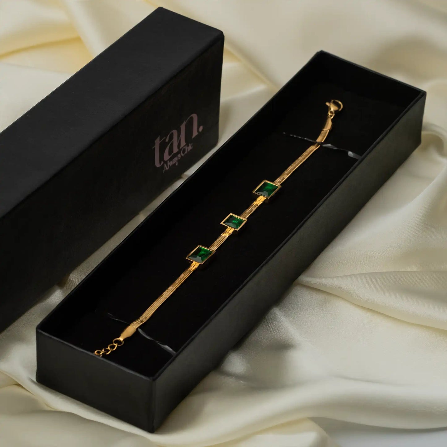 Gold snake chain bracelet with green emerald square stones, tarnish-resistant jewelry for women