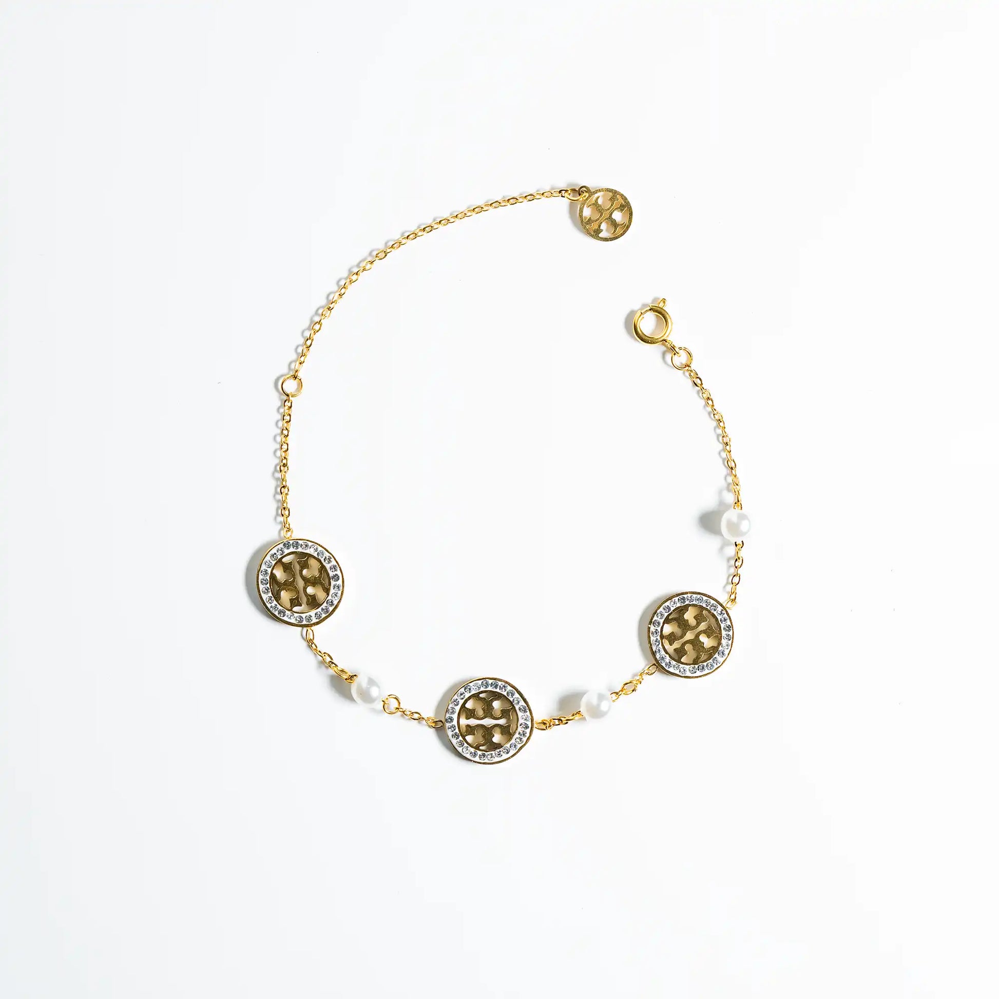 elegant pearl and zircon golden bracelet with adjustable lock