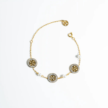 elegant pearl and zircon golden bracelet with adjustable lock