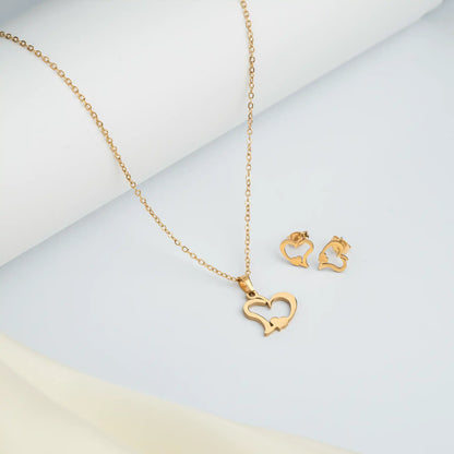 Tan. gold heart necklace and earring gift set with premium branded packaging.