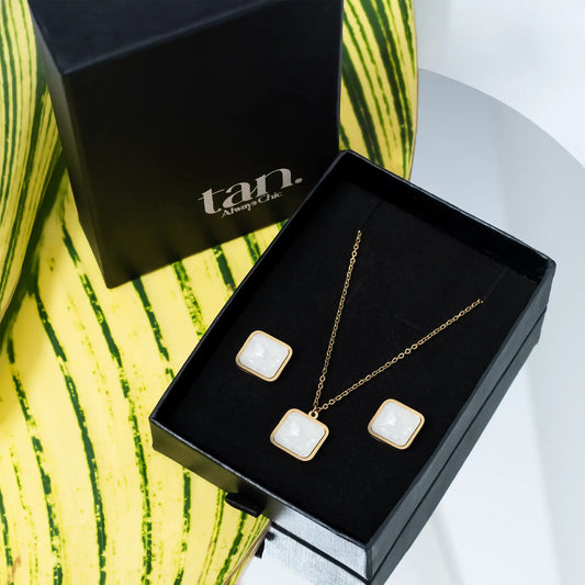 white stone inlay pendant set with studs in premium gift box by tan.