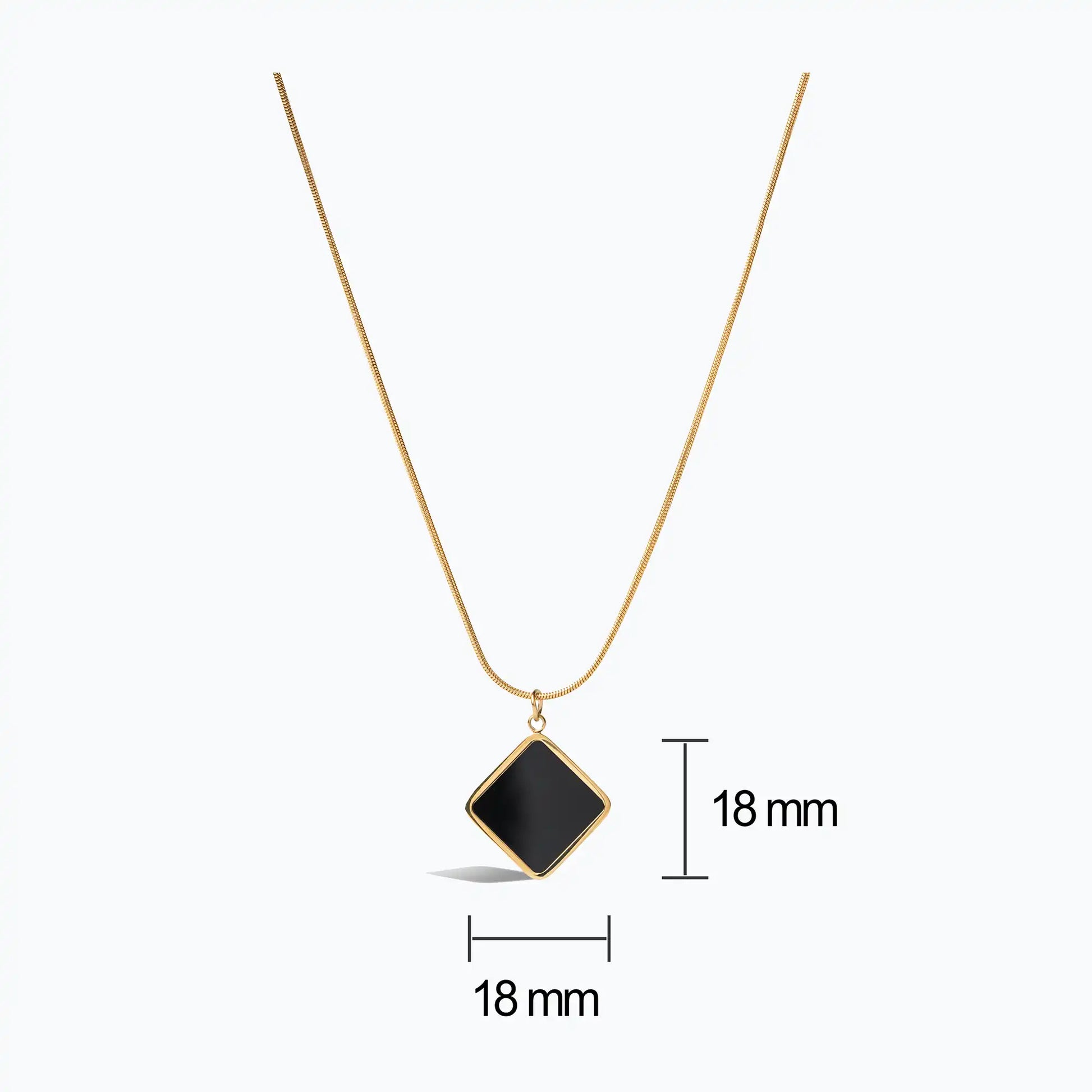 Gold snake chain necklace with a square black onyx pendant