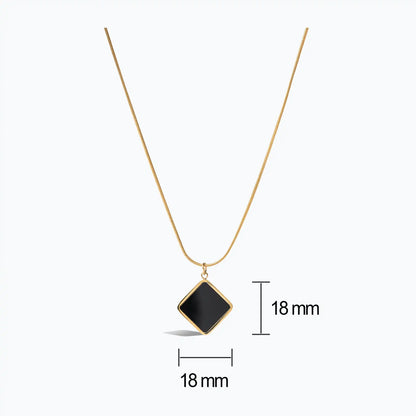 Gold snake chain necklace with a square black onyx pendant
