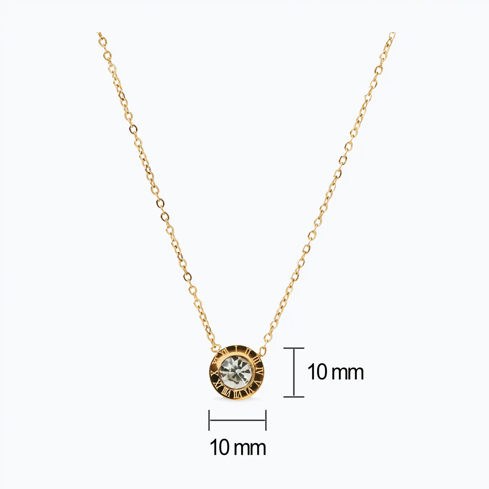 golden chain necklace with small circular pendant engraved with roman numbers and zircon stone