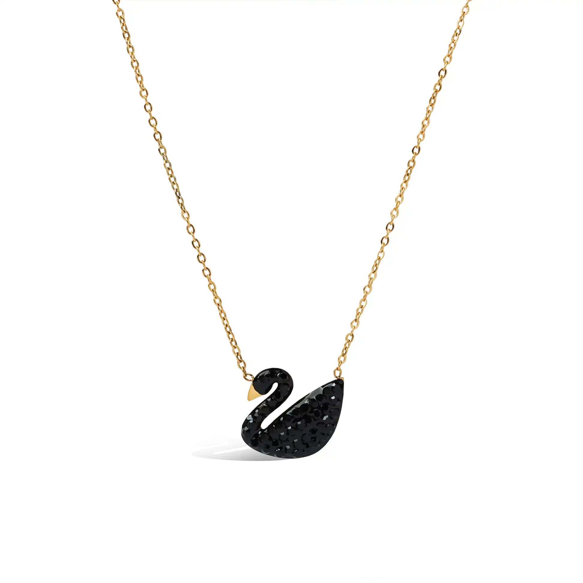 Dainty gold link necklace with a black pave crystal swan charm.