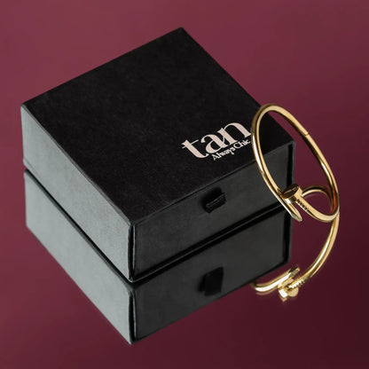 adjustable gold nail bracelet for women with premium packaging by tan.