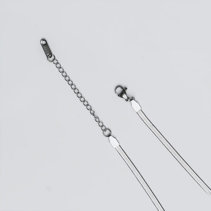 adjustable lock of tarnish-resistant silver snake chain anklet by tan.