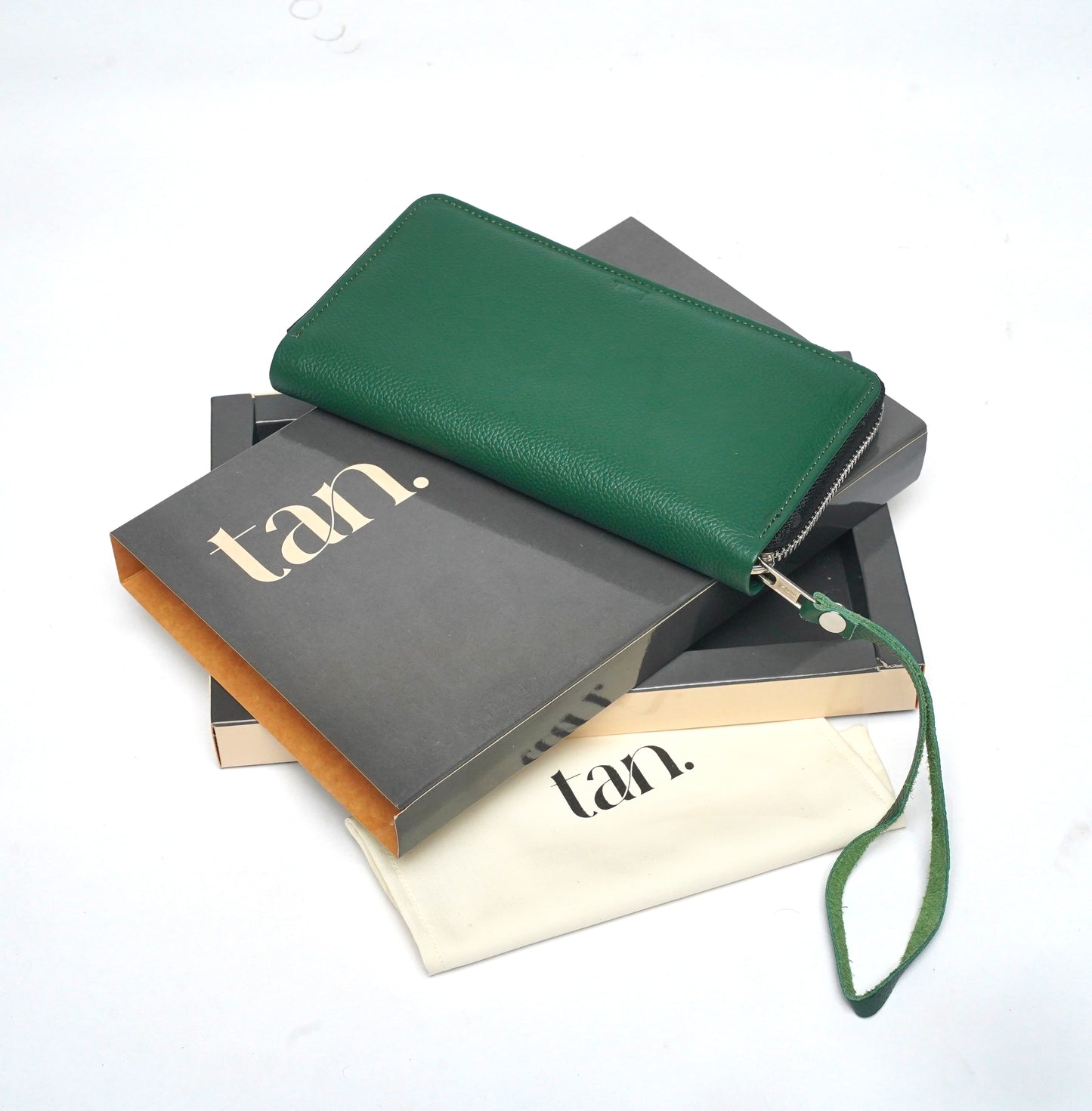 green zip around ladies wallet with wrist strap