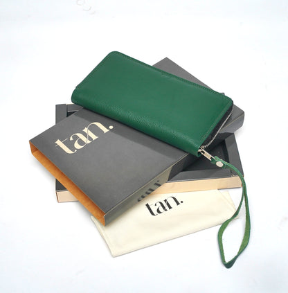 green zip around ladies wallet with wrist strap