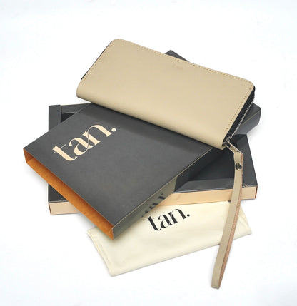 Beige zip-around clutch wallet with wrist strap - Tanstore Pakistan.