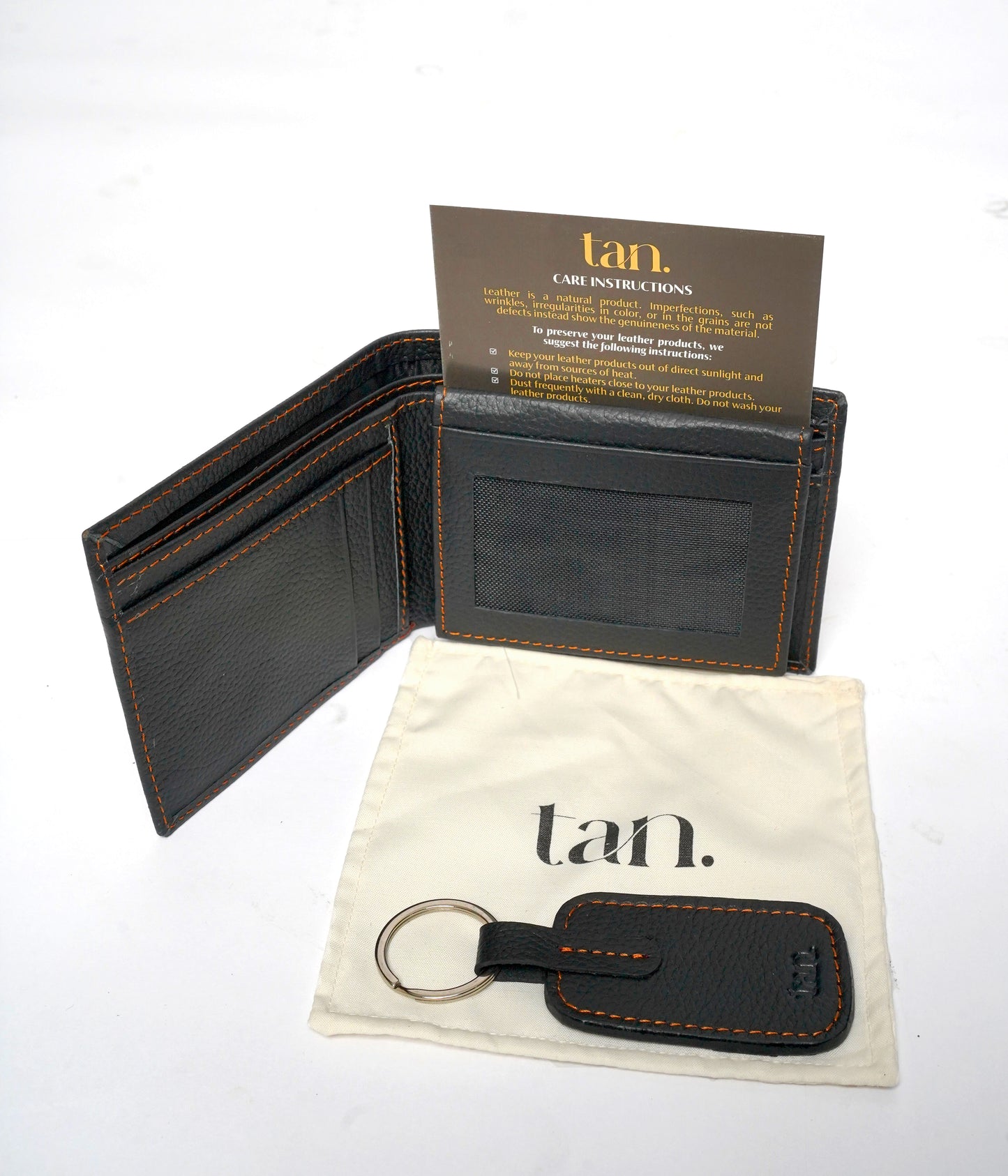 Black leather wallet and keychain set with care instructions by tanstore.pk